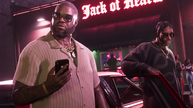 Boobie and Dre’Quan getting out of a car outside the Jack of Hearts