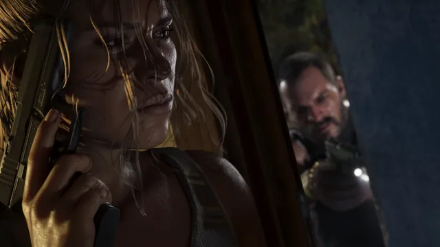 Lucia hiding behind a half-open door holding a handgun